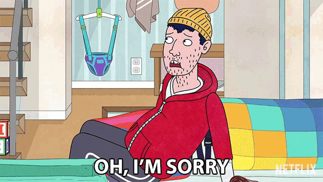 a cartoon of a man sitting on a couch with the words oh i 'm sorry