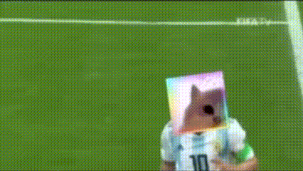 a soccer player with a paper bag on his head and the number 10 on his jersey