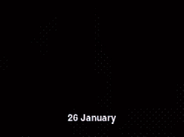 a person is waving an indian flag with the date 26 january