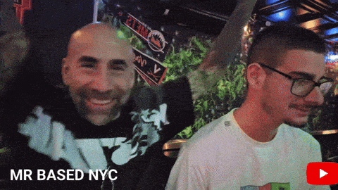 two men are standing next to each other with the words mr based nyc on the bottom right