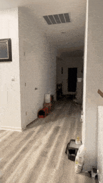 a hallway in a house with a bag of dog food
