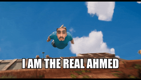 a man is flying through the air with the words " i am the real ahmed " above him
