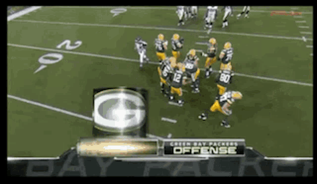 a green bay packers game is being played on a television screen