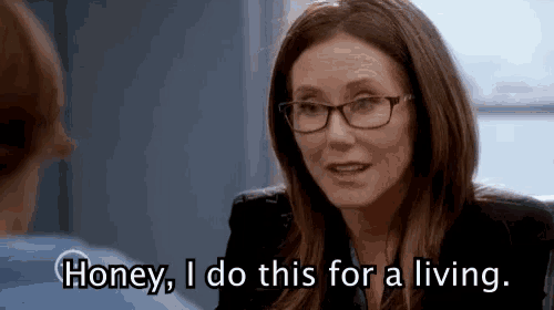 a woman wearing glasses is talking to a man and says honey i do this for a living