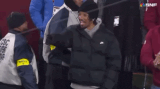 a man wearing a jacket that says csc on the back