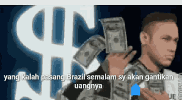 a man is holding a bunch of money in front of a sign that says $