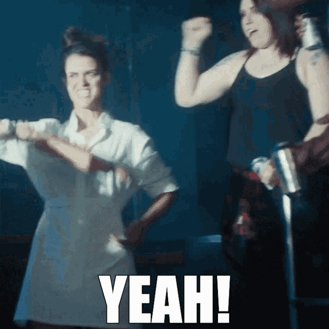 a woman in a white shirt is dancing with the word yeah written below her