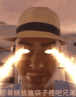 a man wearing a hat has chinese writing on his eyes