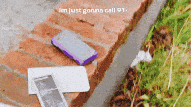 a cell phone laying on a brick ledge with the words im just gonna call 91 on the bottom