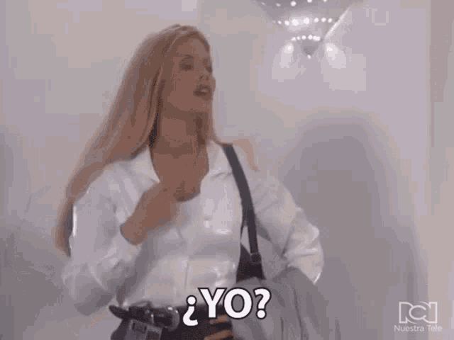 a woman is holding a gun and asking " yo "