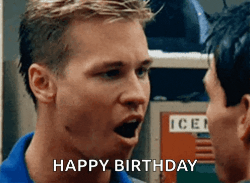 a man is saying happy birthday to another man with his mouth open