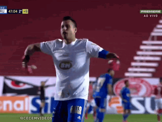 a soccer player wearing a white shirt with bw on the front