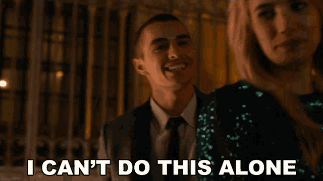 a man in a suit and tie says " i can t do this alone "