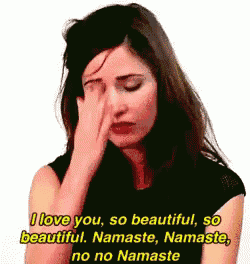 a woman is covering her face with her hand and says " i love you so beautiful so beautiful namaste namaste no no namaste "