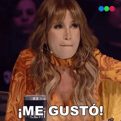 a woman is holding a can of soda and saying me gusto