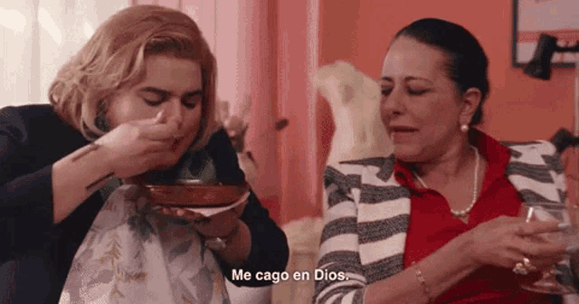 a woman says me cago en dios in spanish