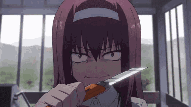 a girl with purple hair is holding a knife and making a face