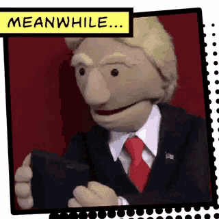 a puppet in a suit and tie is giving a thumbs up with the words meanwhile below him