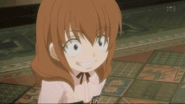 a girl with brown hair and blue eyes is smiling in front of a tv screen that says bsn