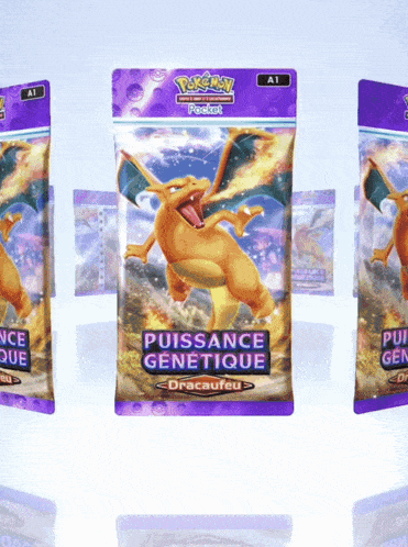 three packs of pokemon cards with a dragon on the front