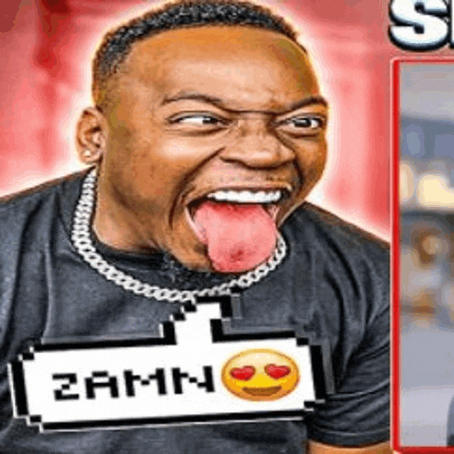 a man is sticking his tongue out and wearing a black shirt with a pixelated smiley face on it .