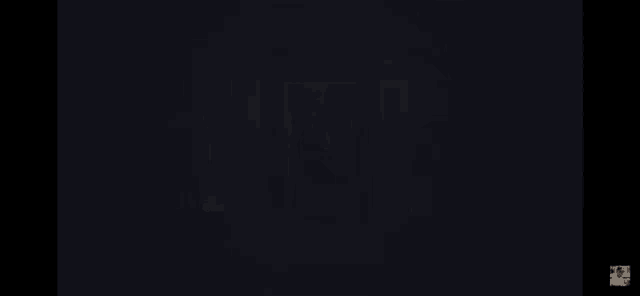 a dark room with a painting on the wall that says " evil "
