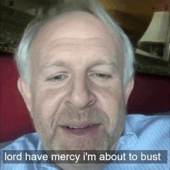 a man with the words lord have mercy i 'm about to bust written on his face