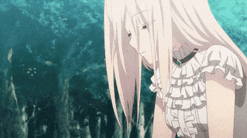 a girl with long blonde hair is wearing a white ruffled shirt and looking down .