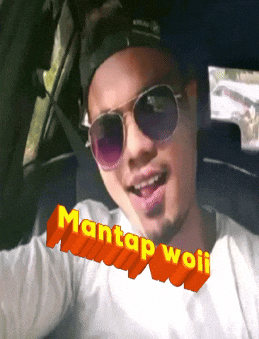 a man wearing sunglasses and a hat with mantap woii written on the bottom
