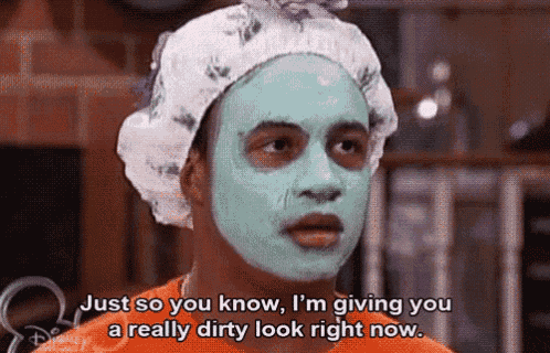 a man with a green face mask and a shower cap says just so you know