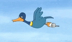 a cartoon duck is flying through a blue sky with a can in its beak .