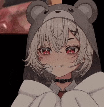 a girl wearing a teddy bear hood and a choker