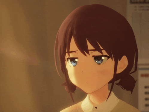 a close up of a girl 's face with a bun