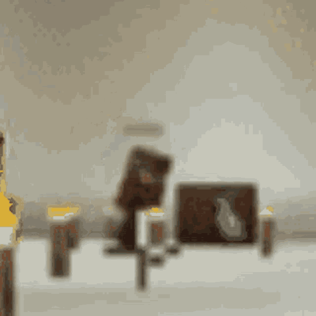 a blurred image of a shelf with a picture of a person on it