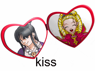 a picture of a girl and a boy in a heart shaped mirror with the word kiss above them