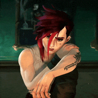 a woman with red hair has a tattoo on her arm that says ' x '