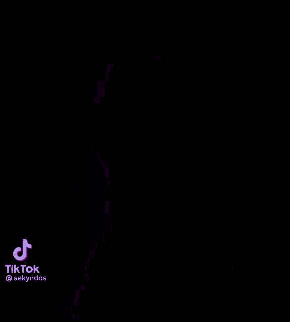 a purple anime girl in a purple dress is dancing in the dark .