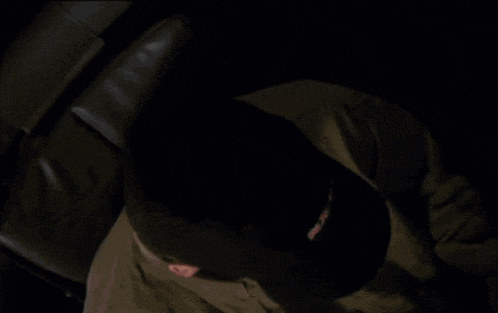 a man wearing a hat that says mtx-801 on it