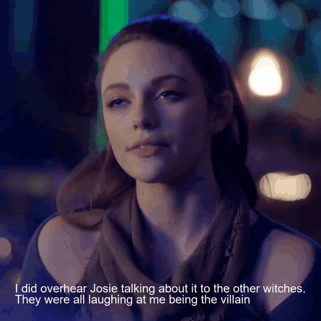 a close up of a woman 's face with a quote behind her