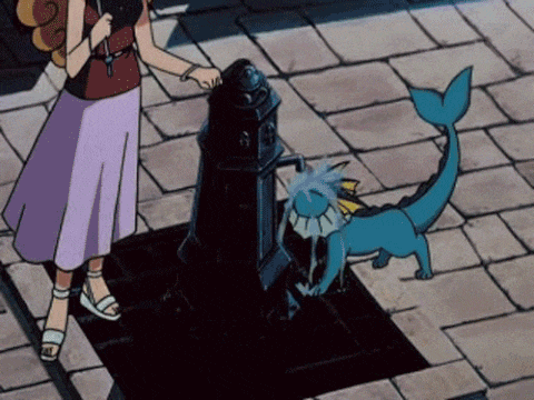 a woman is standing next to a pokemon that is drinking water