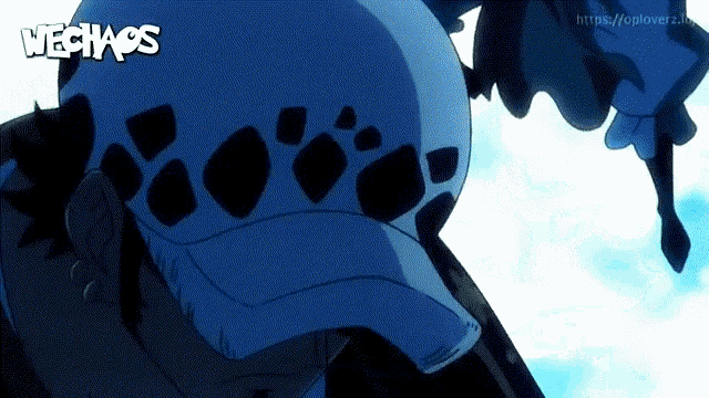 a person wearing a blue hat with the word nechaos on the bottom