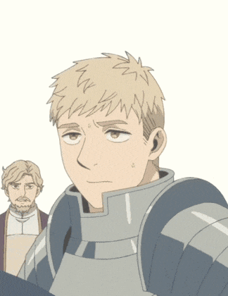 a man in a knight 's armor is looking at the camera