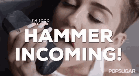 a woman is holding a hammer in her mouth and the words hammer incoming are above her