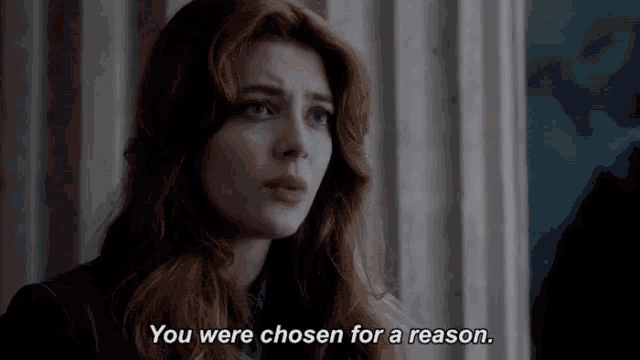 a woman with red hair is saying you were chosen for a reason