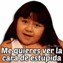 a little girl with long hair is wearing a sticker that says `` me quieres ver la cara de stupida '' .