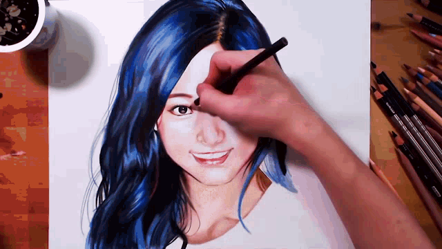 a drawing of a woman with blue hair is being drawn