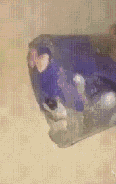 a purple soap bar with a heart on it