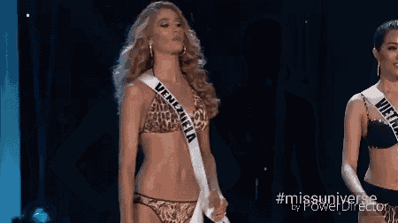 a group of women in bikinis are standing on a stage with the hashtag #missuniverse in the corner