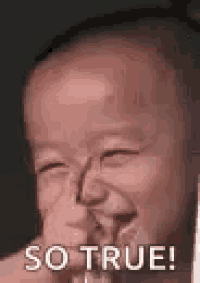 a baby is making a funny face and smiling with the words `` so true '' written below it .