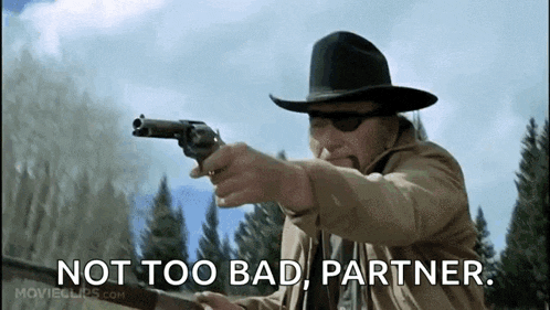 a man in a cowboy hat is pointing a gun at the camera with the words not too bad partner written below him .